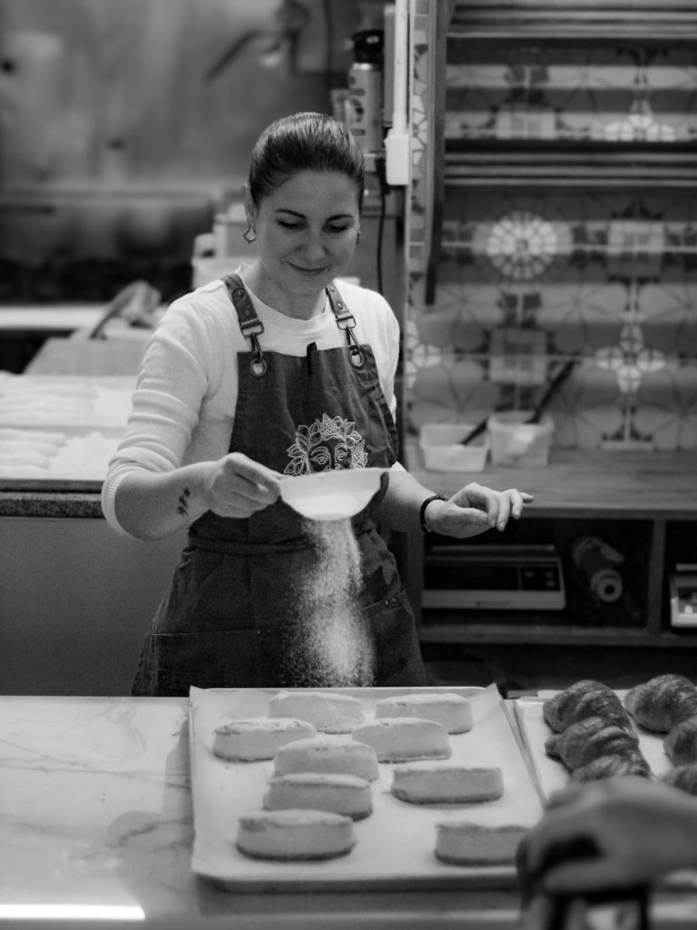Baker dusting pastries