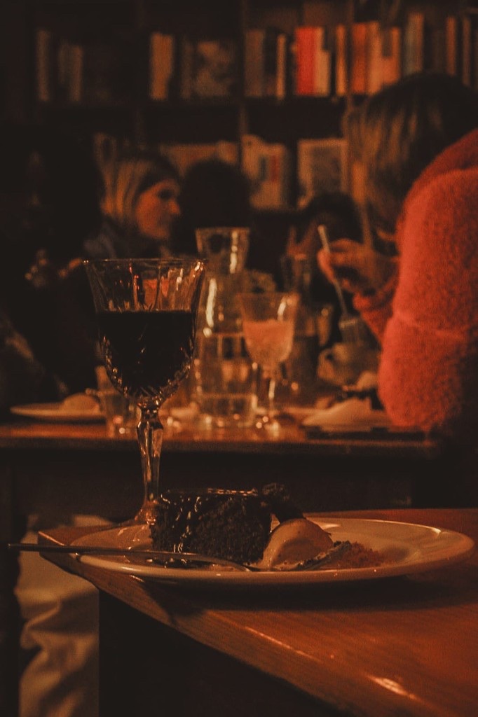 Wine and dessert in warm light