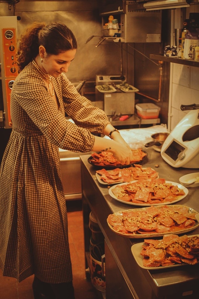 Plating ravioli in the kitchen